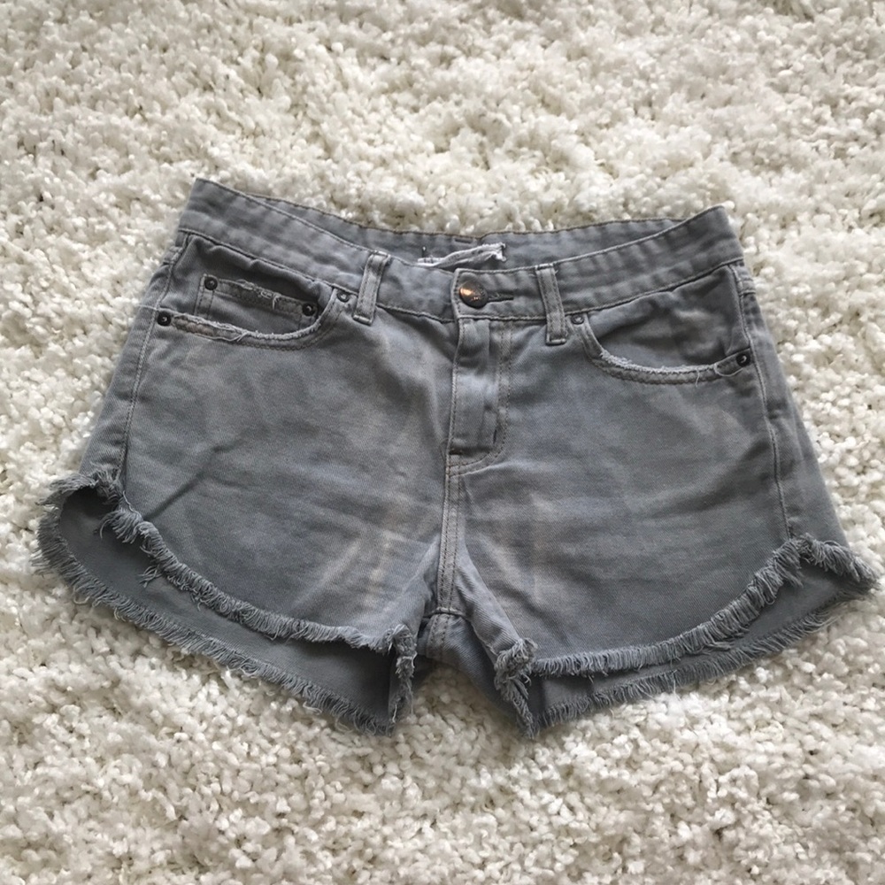 Free People faded denim shorts